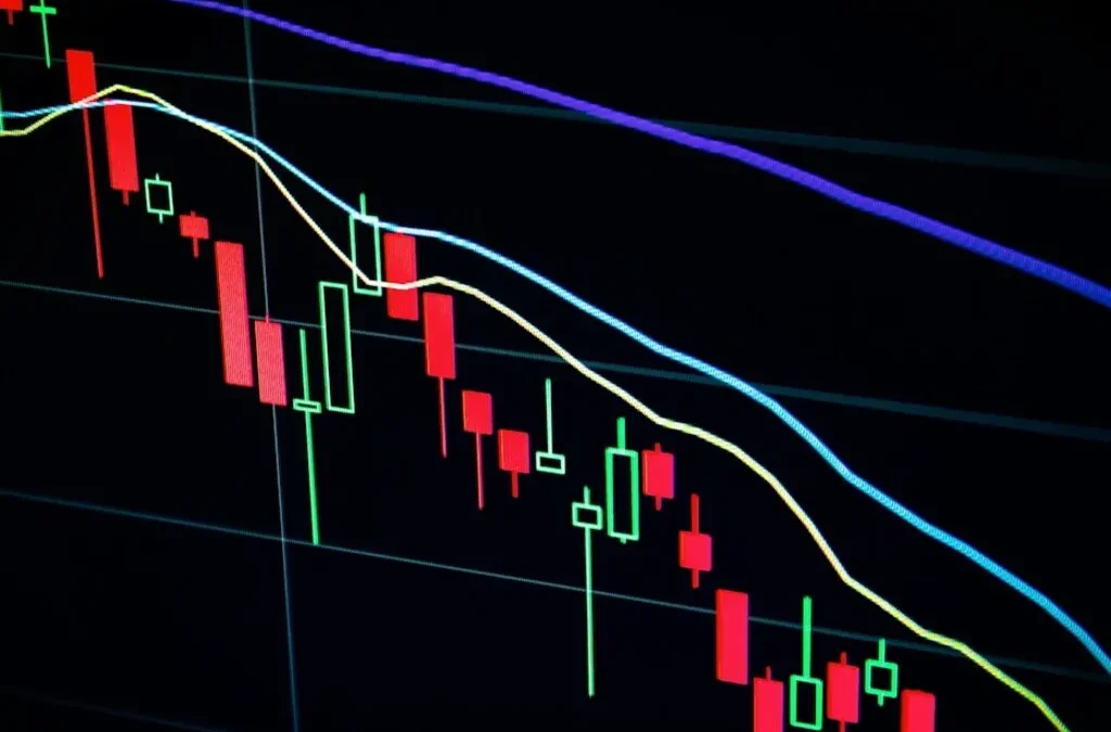 Graphique boursier candlesticks sur écran sombre